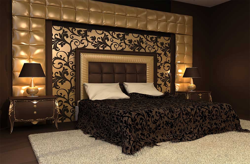 Bedroom with an ornate upholstered headboard and matching bedside cabinets