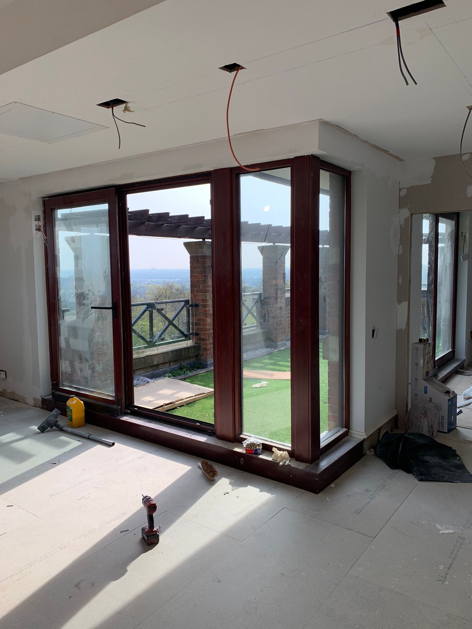 Newly glazed garden room with timber-framed doors