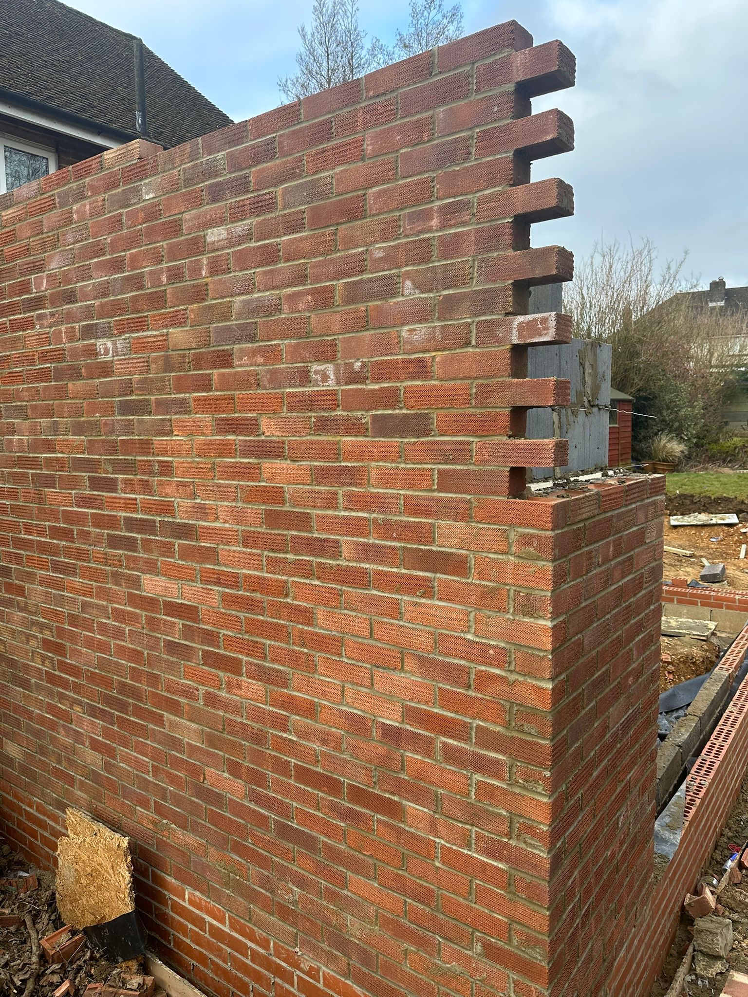 New structural opening formed in an existing brick wall
