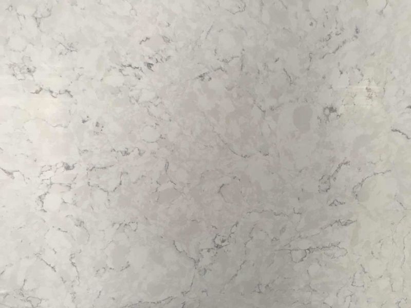 Pale grey stone surface with a cloudy natural pattern